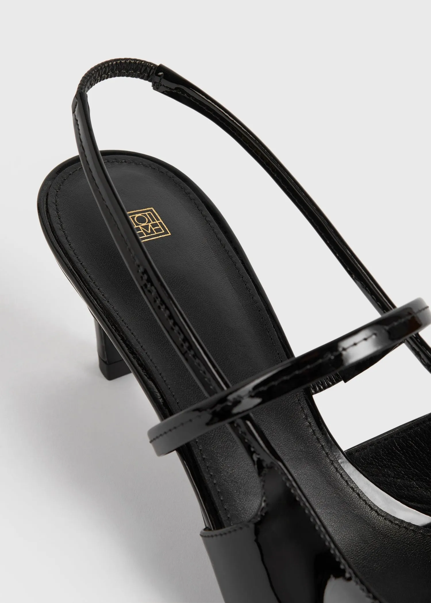 Sharp patent slingbacks black
