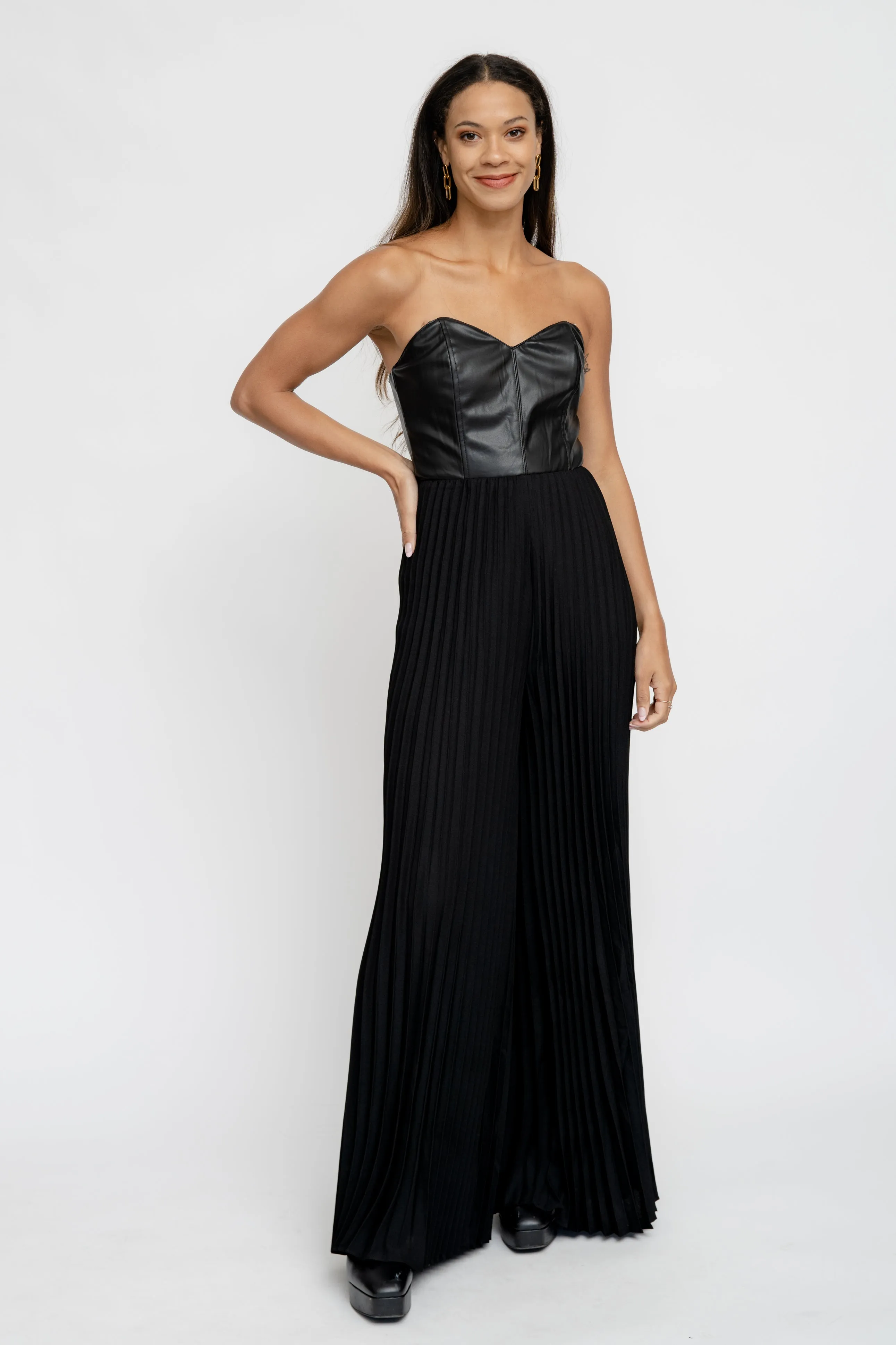 STRAPLESS FAUX LEATHER PLEATED JUMPSUIT